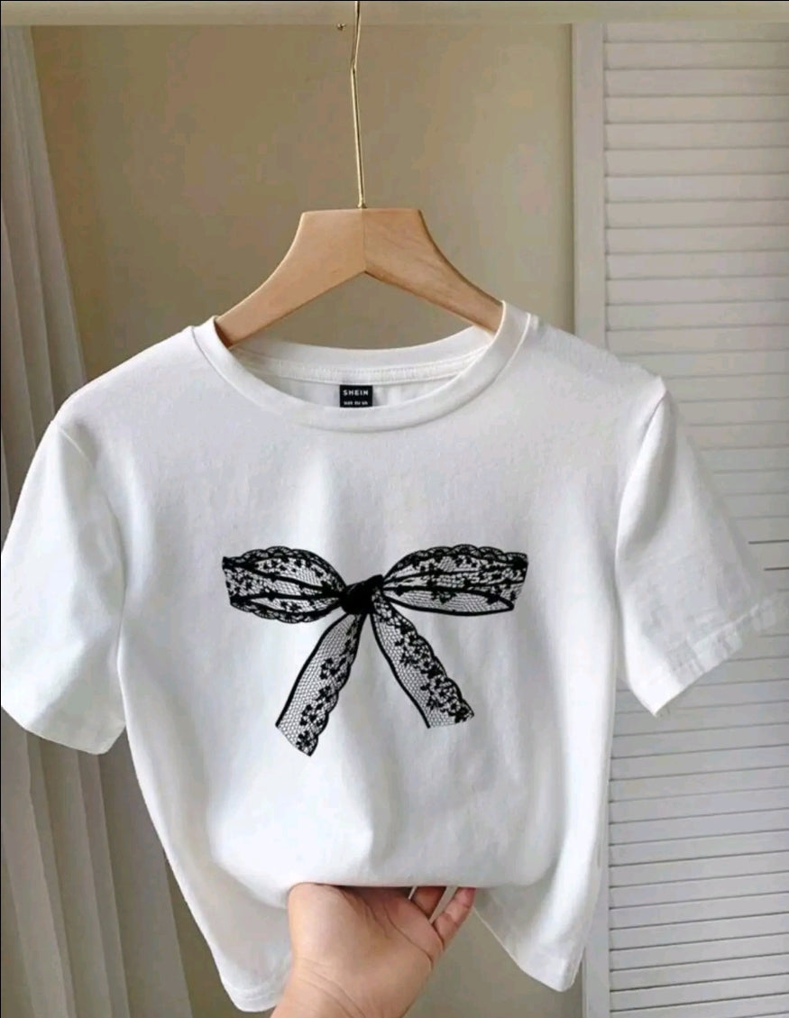 Camiseta Casual para Mujer con Estampado de moño negro grande - Mezcla de Poliéster Suave, Cuello Redondo, Manga Corta, Tejido de Punto Semi-Transparente, Lavable a Máquina, Camiseta para Uso Diaric ITop de Cuello Redondo | Material Semi-Transparente