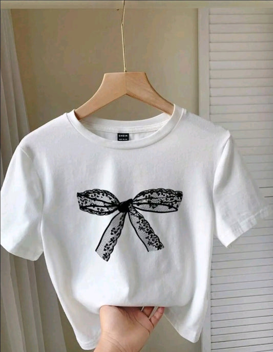Camiseta Casual para Mujer con Estampado de moño negro grande - Mezcla de Poliéster Suave, Cuello Redondo, Manga Corta, Tejido de Punto Semi-Transparente, Lavable a Máquina, Camiseta para Uso Diaric ITop de Cuello Redondo | Material Semi-Transparente